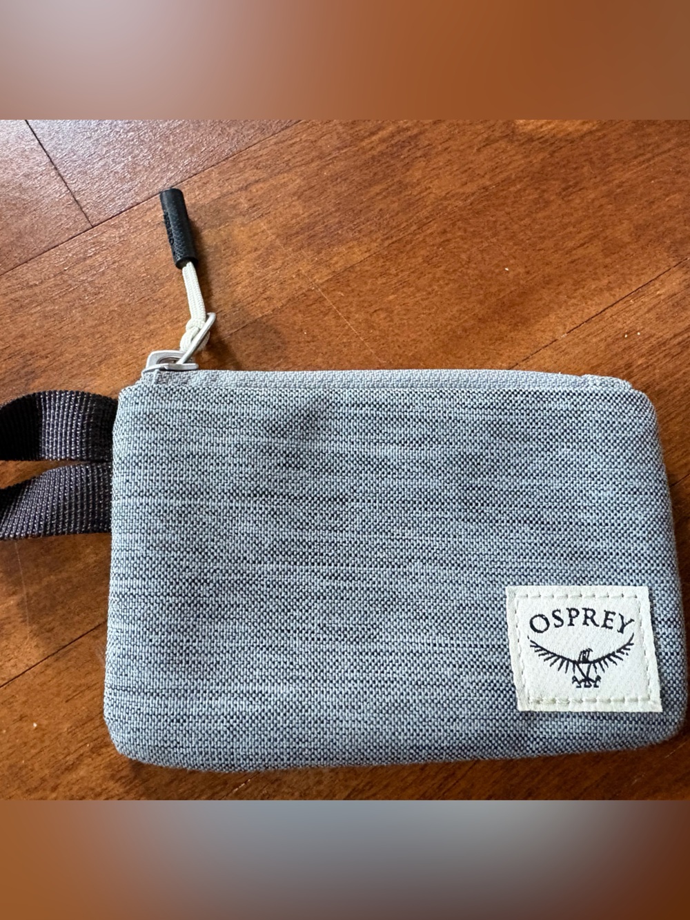 Small grey Osprey accessory pouch
